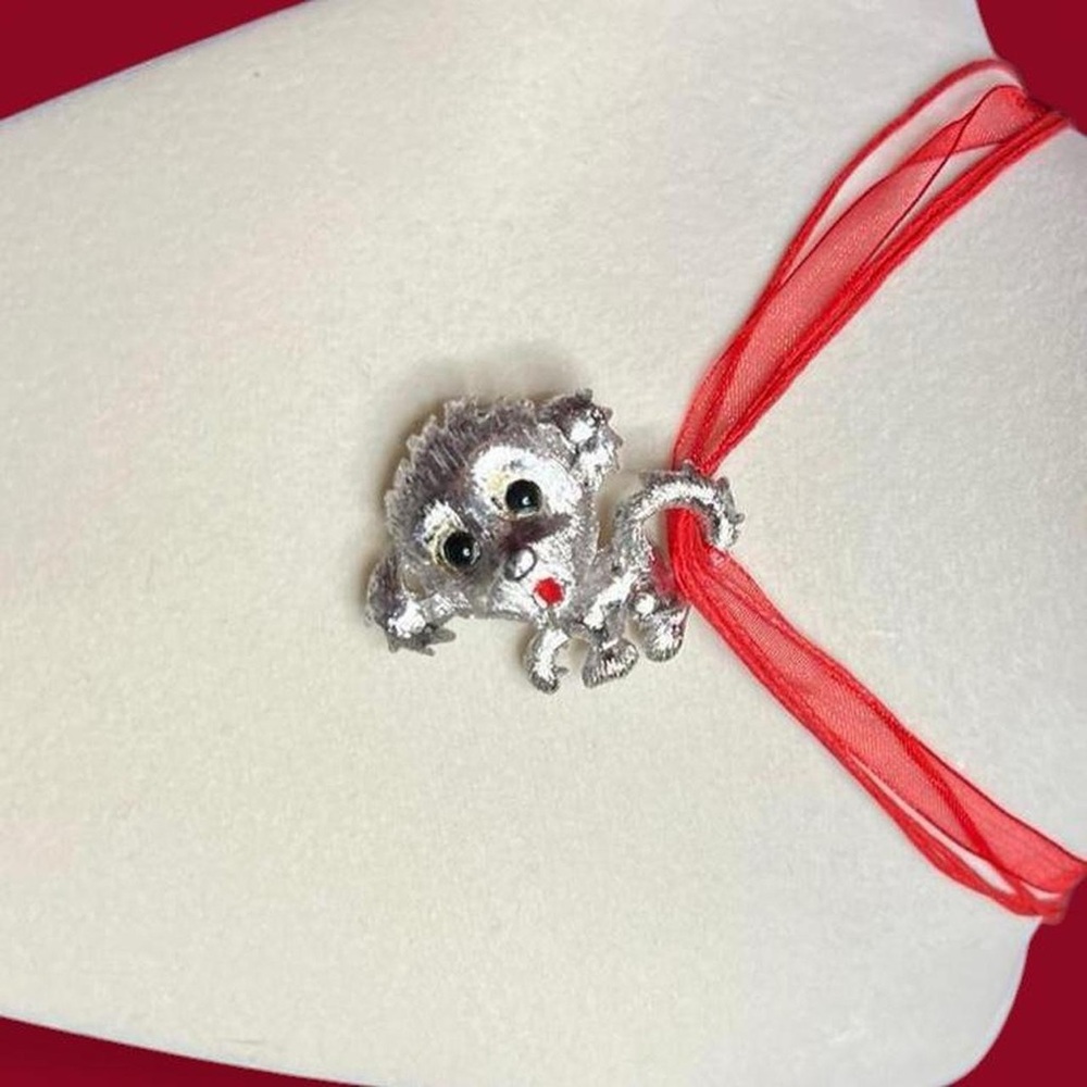 Monet Silver puppy Pendant on Red Necklace